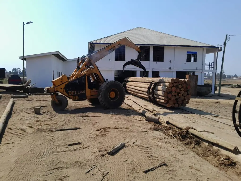 Loading poles onto a truck
