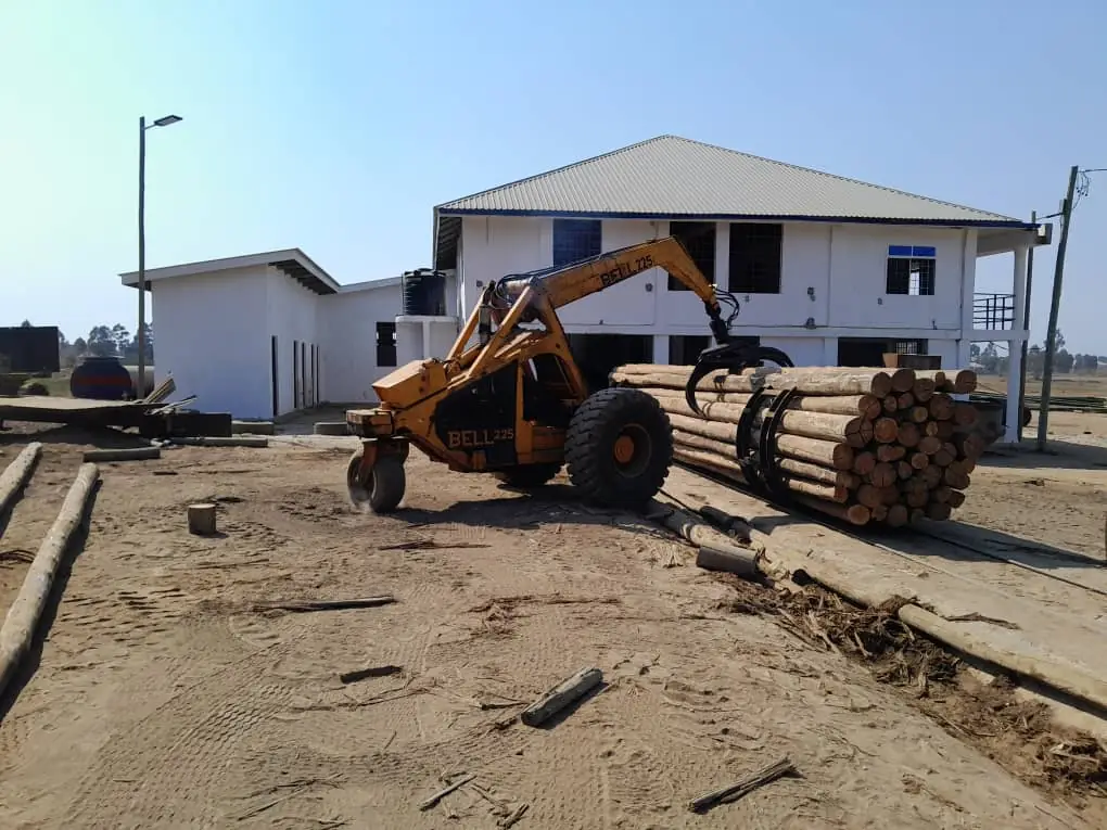 Loading poles at the plant